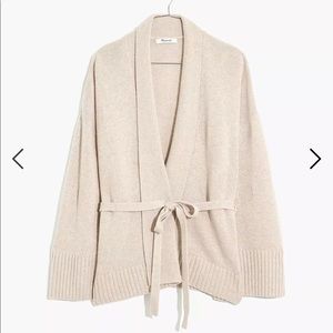 Madewell wrap sweater in oatmeal/cream color. The pattern has subtle polka dots